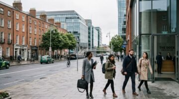 Professionals arriving at a Dublin office building, illustrating the Ireland General Employment Permit route for non-EEA workers
